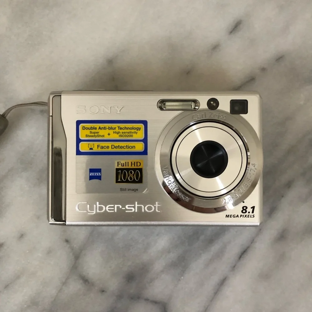 WORKS Sony Silver Cyber-shot Compact Digital Camera with Wrist Strap